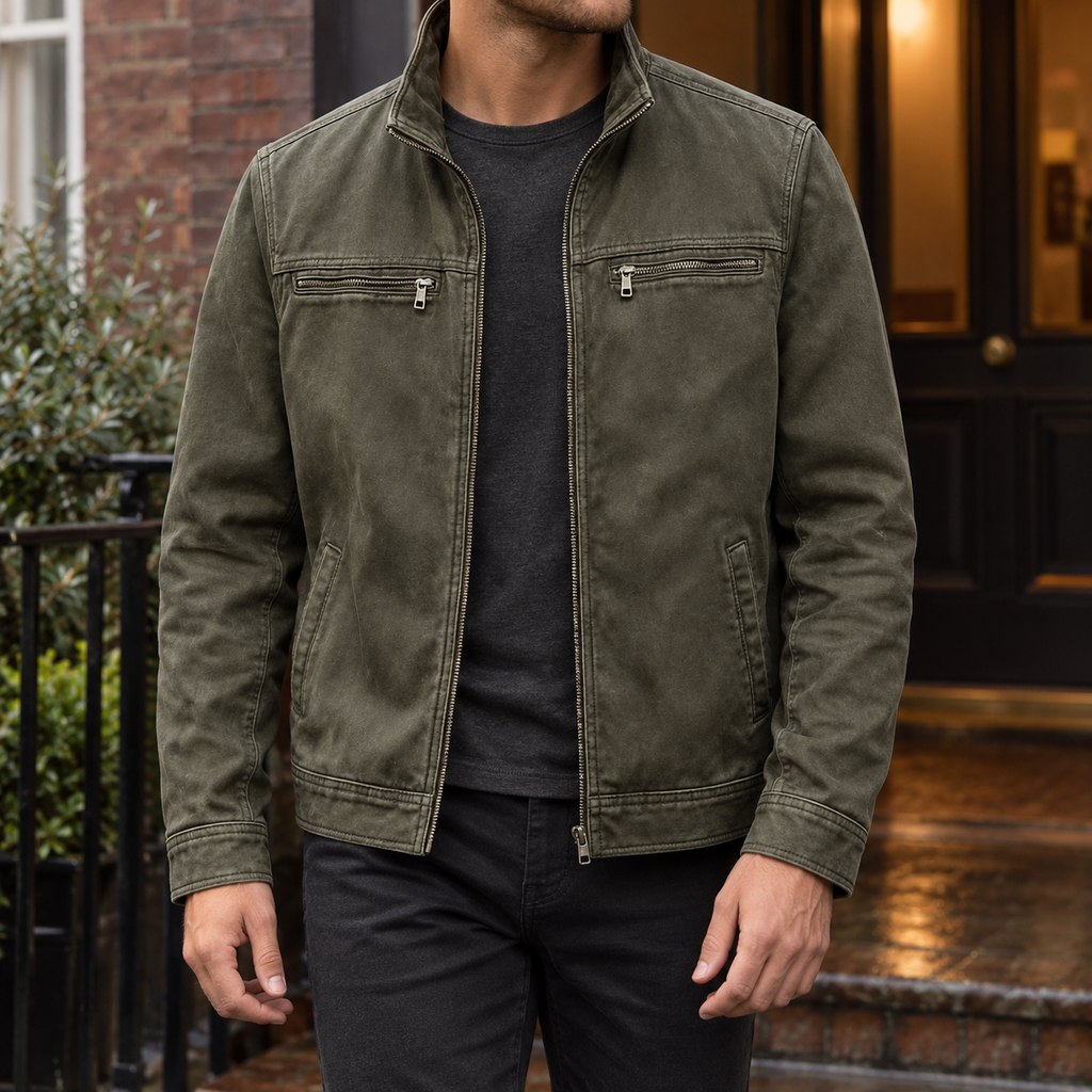 Men's black leather-look jacket with four pockets and metal zips