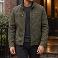 Men's black leather-look jacket with four pockets and metal zips