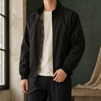Men's black Harrington jacket with plaid lining and stand collar