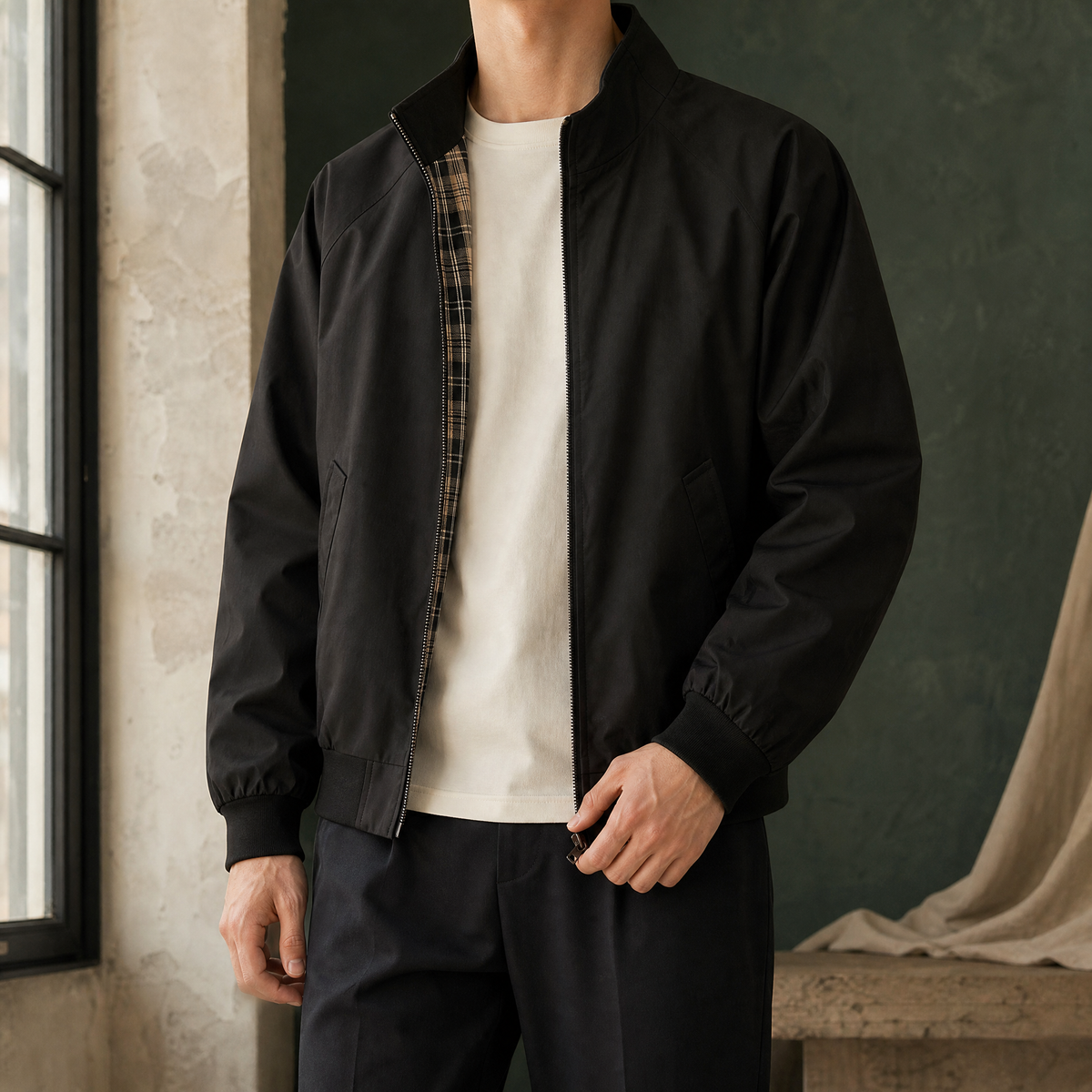 Men's black Harrington jacket with plaid lining and stand collar