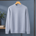 Man wearing a black wool blend mock neck jumper