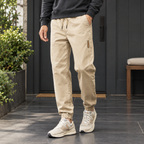 Men's khaki relaxed tapered trousers with drawstring waist