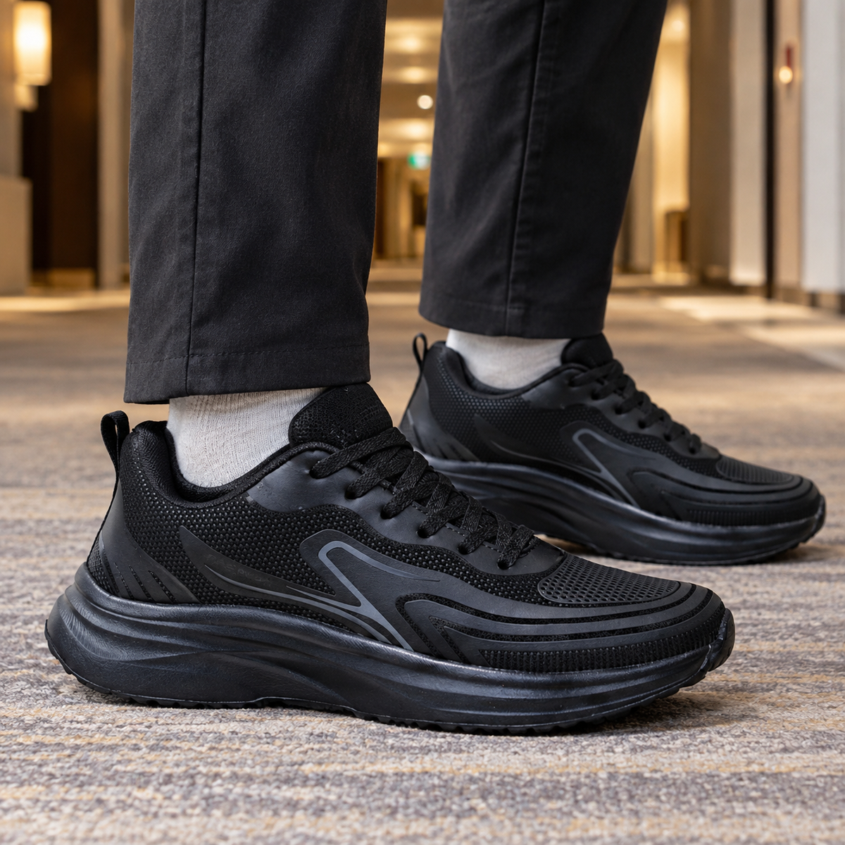 Men's black leather lace-up trainers