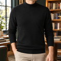 Man wearing a black wool blend mock neck jumper