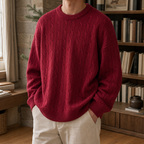 Men's red cable knit jumper with ribbed cuffs