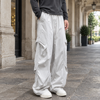 Men's black wide leg cargo trousers with drawstring waist