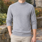 Man wearing a gray mock neck jumper