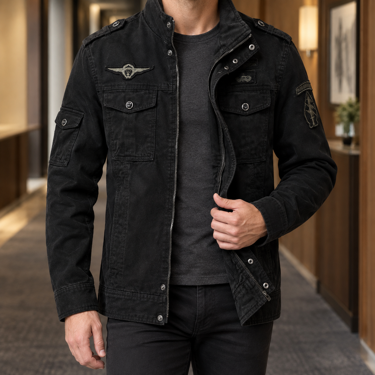 Men's black military style jacket with epaulettes and flap pockets