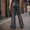 Men's black flare jeans with embroidered rear pocket detail