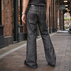 Men's black flare jeans with embroidered rear pocket detail