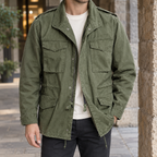 Man wearing an army green cotton field jacket