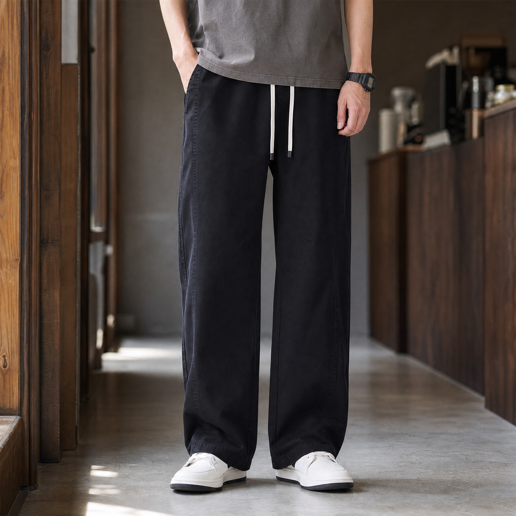 Men's relaxed fit cotton trousers in black with drawstring waist